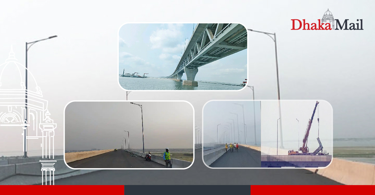 পদ্মা সেতুর ল্যাম্পপোস্টে বিদ্যুৎ সংযোগের কাজ চলছে