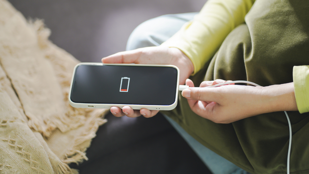 charging smartphone during rainy season