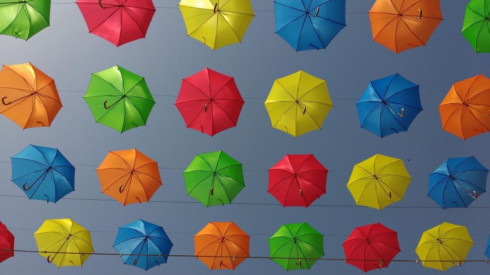 colorful-umbrellas-hanging-from-a-line