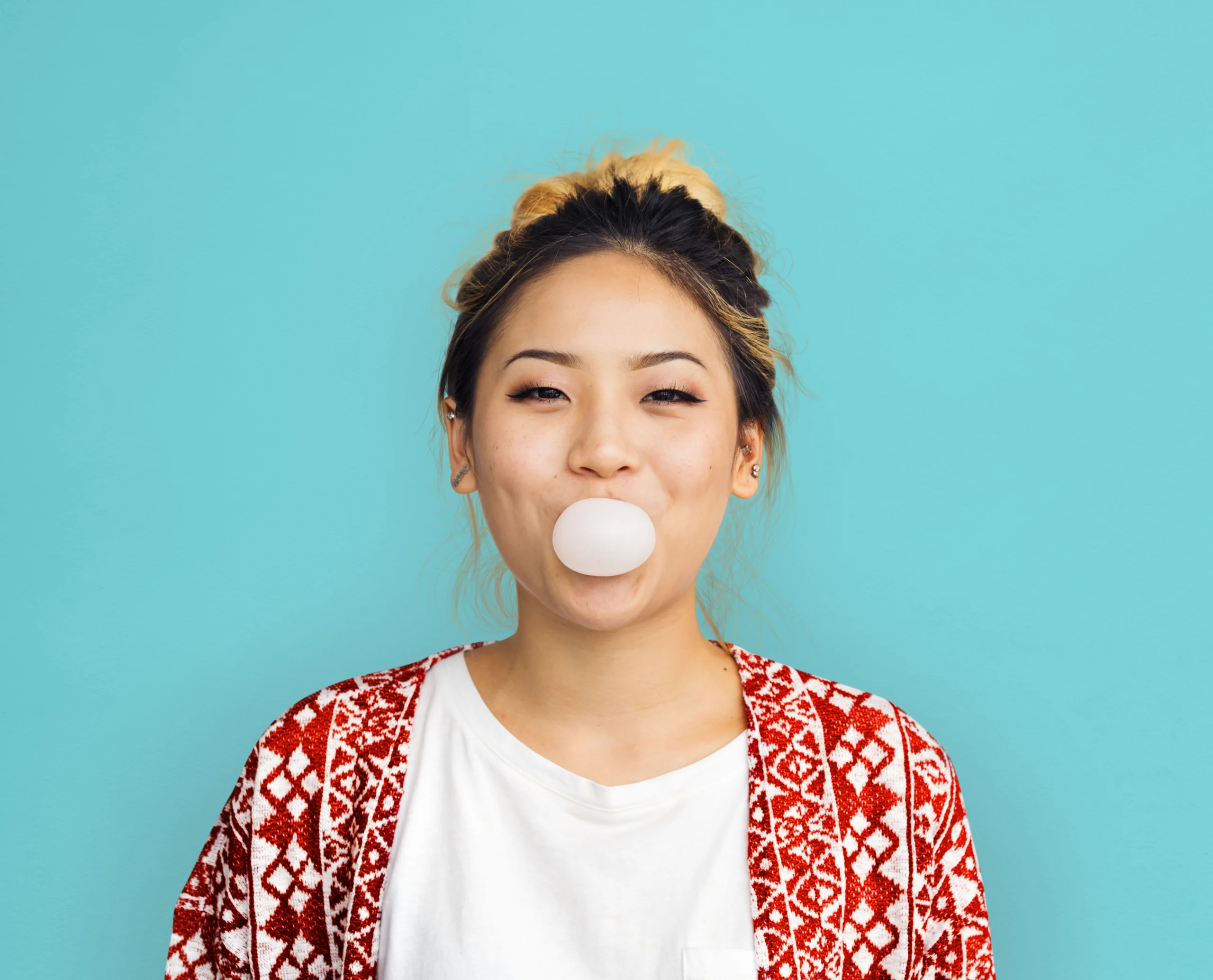 young-girl-chewing-bubble-gum-concept-2023-11-27-05-31-04-utc-scaled