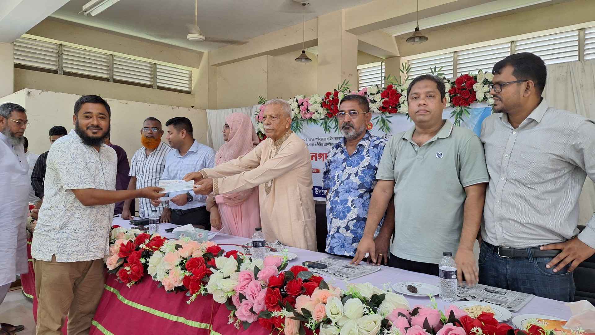 ফেনীতে ৫৫ লাখ টাকার টিআর-কাবিখার চেক বিতরণ