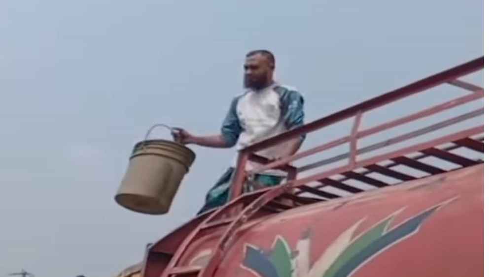 ডিপোর গাড়ি মাঝপথে থামিয়ে নামানো হচ্ছে তেল, ভিডিও ভাইরাল